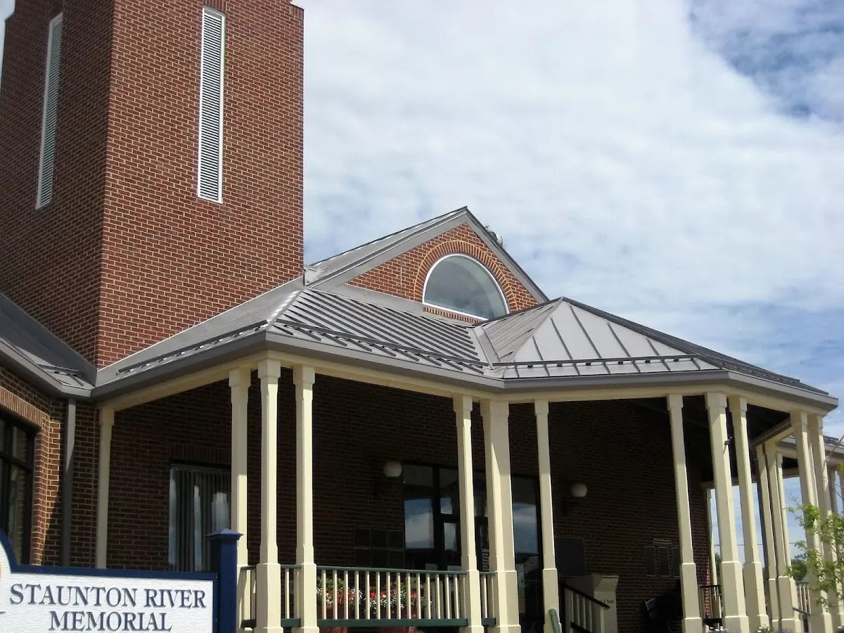 Skilled roofing craftsmen working on a residential roof in Overview